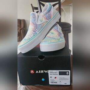 Airwalk slip on tennis shoes. Size eight, light tie-dyed color.